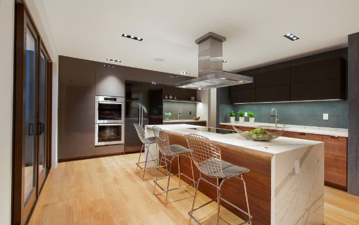 Interiors of modern kitchen furnished apartment