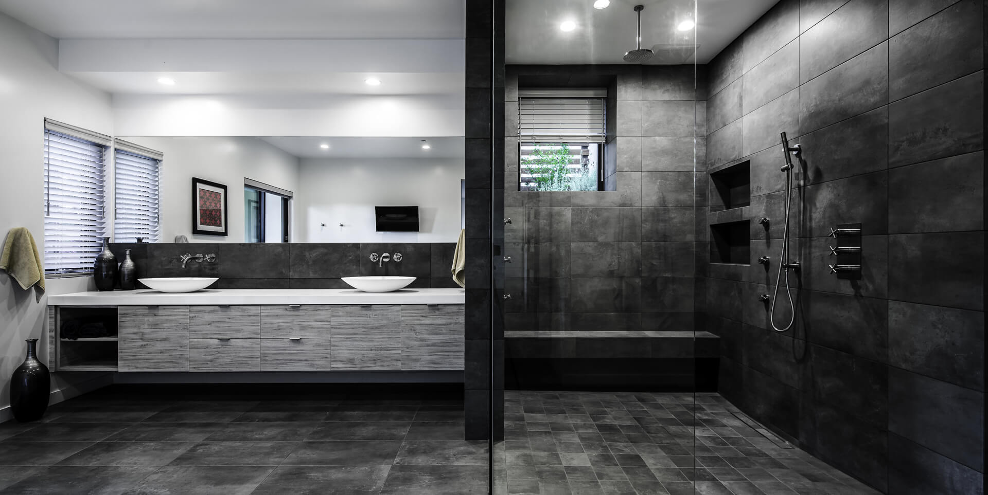 Grey bathroom interior with sink and douche